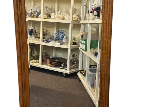 Oak framed rectangular bevelled wall mirror, 171 by 91cm, including frame.