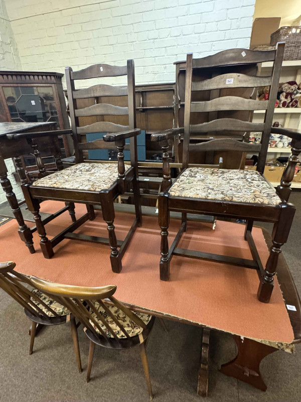 Eight piece suite of Ercol Old Colonial comprising shelf back dresser, open topped standing corner cabinet, rectangular dining table, set of four Goldsmith dining chairs and plate rack together with a pair of tapestry seated carver chairs and stool (11).