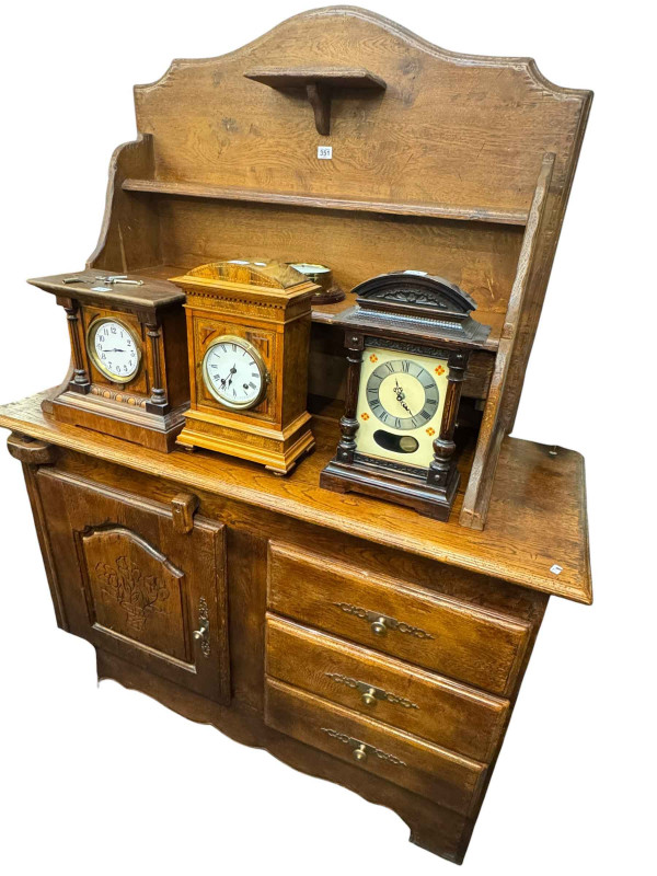 Continental rustic style eight piece dining suite comprising waterfall shelf back dresser, rectangular two drawer dining table, pair jointed benches and four rush seated chairs.