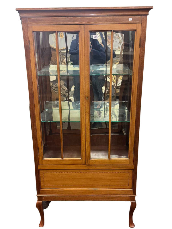 Edwardian mahogany and chequer inlaid two door vitrine on cabriole legs with later added illumination, 163 by 81.5 by 36.5cm.