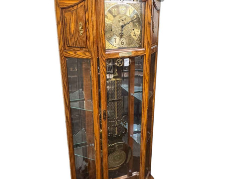 Oak cased American triple weight longcase clock having moon phase dial...