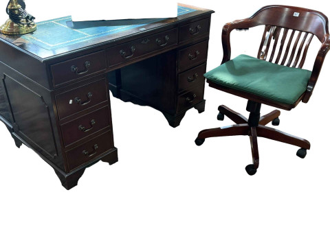 Mahogany eight drawer pedestal desk, swivel desk chair and brass desk...