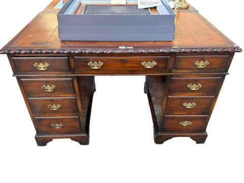Robson's of Newcastle 1920's mahogany nine drawer pedestal desk, 76cm...