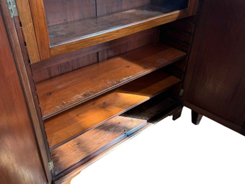 Victorian mahogany cabinet having two panelled doors enclosing a glazed fall front door above two adjustable shelves, 121cm by 107cm by 32.5cm. thumbnail