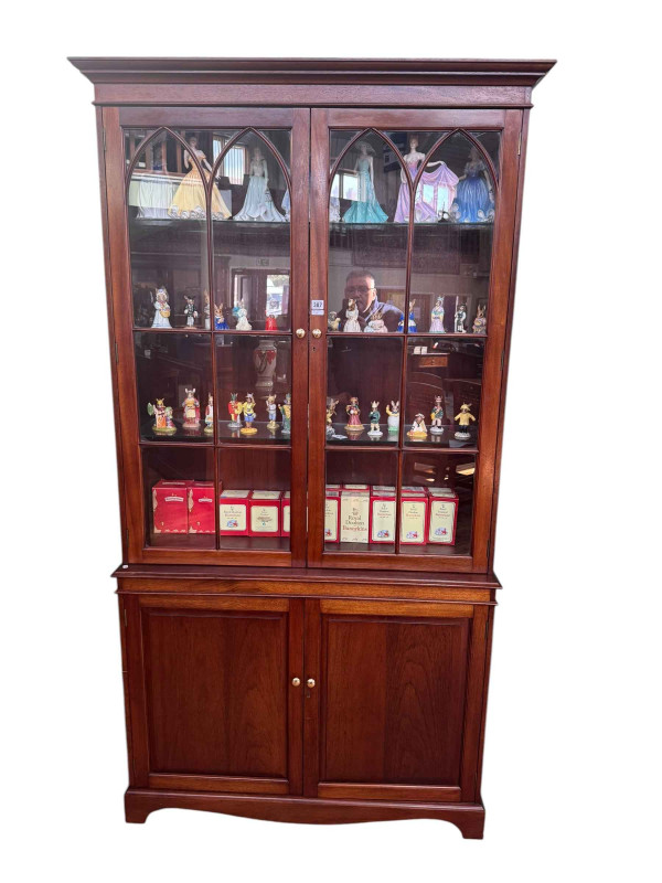Farquharson and Baume, Millgate, Thirsk bespoke four door cabinet bookcase, 213cm by 115cm.