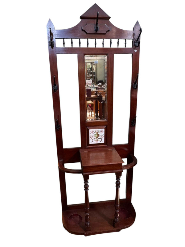 Victorian mahogany mirror backed hallstand with tiled panel, 206cm by 81cm by 35cm.