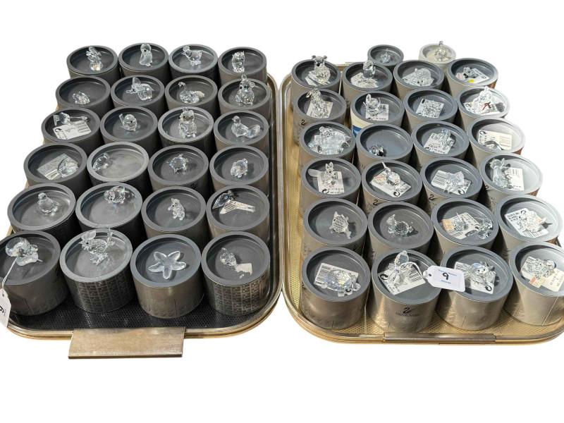 Swarovski; Fifty small pieces with boxes.