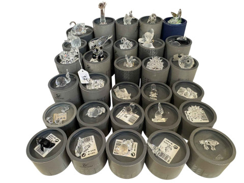 Swarovski; Thirty small and medium pieces with boxes.