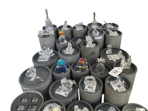 Swarovski; Twenty Seven small and medium pieces with boxes.