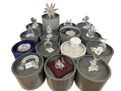 Swarovski; Fifteen large pieces with boxes including rearing horse, yacht...