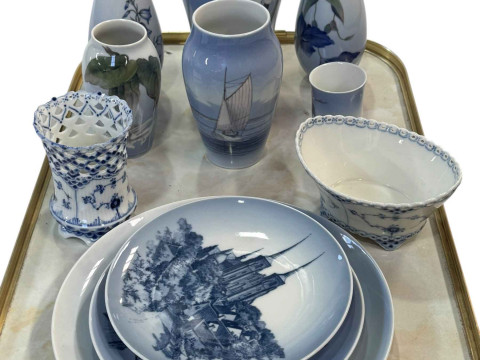 Eight Royal Copenhagen vases and three plates.