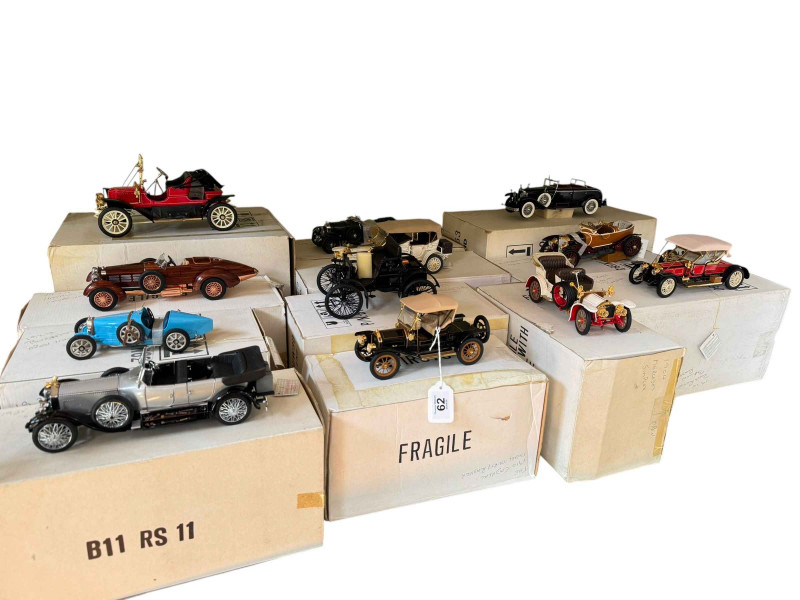 Collection of twelve Franklin Mint models of early 20th Century motor vehicle including 1910 Rolls Royce balloon roadster, 1925 Bugatti type 35, 1911 Rolls Royce tourer.