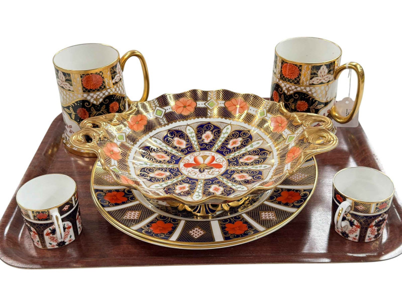 Royal Crown Derby pedestal bowl, two 27cm diameter plates, pair of tankards and a pair of coffee cans.