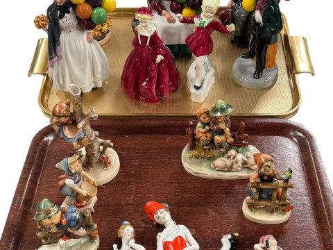 Five Royal Doulton, two Royal Worcester and five Hummel figures, and four...