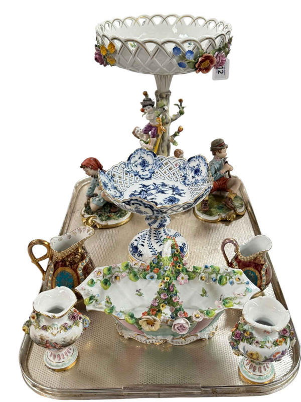 Continental porcelain centrepiece, floral encrusted basket and pair of vases, two Capo di Monte figures, Meissen pierced blue and white china pedestal dish and two jugs.