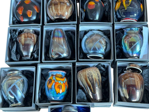 Collection of Poole Pottery vases and ginger jars (all boxed as new).