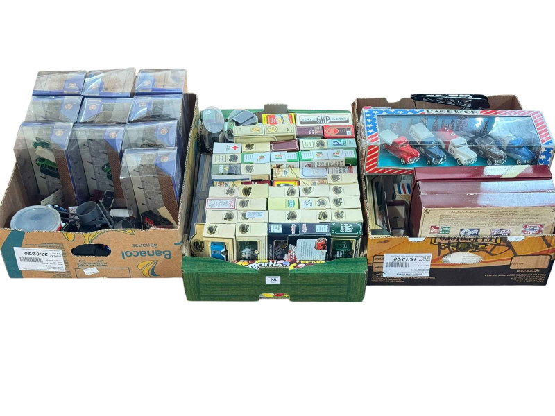 Three boxes of model vehicles including Lledo.