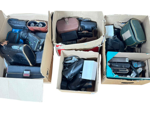Four boxes of cameras, lenses, binoculars, etc.