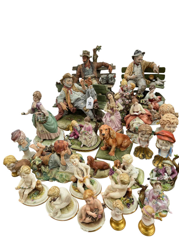 Three Capo di Monte Tramp on bench figures, various Capo di Monte figures, cherubs, bust, etc.