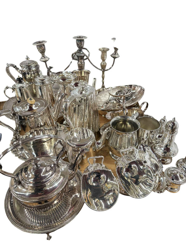 Collection of silver plate including teapots, candelabra, two scuttles with shovels, salt, pepper and sugar sifter, etc.