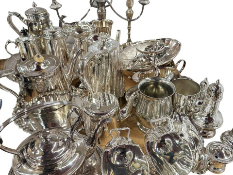 Collection of silver plate including teapots, candelabra, two scuttles...