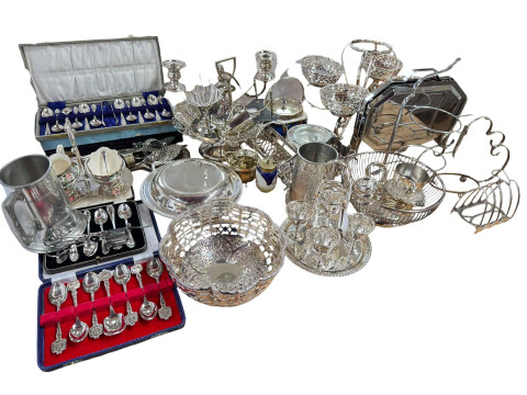 Collection of silver plate including bon bon stand, candelabra, egg cruet,...