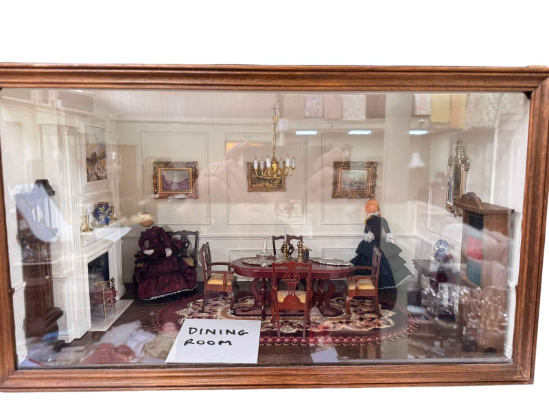 Two dolls houses 'The Queens Bedroom' and 'Dining Room'.