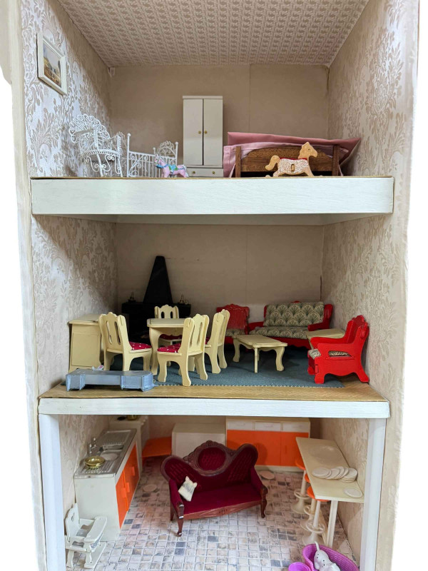 Three dolls houses 'Antique Shop', 'Nursery' and three story box house and a shop front.