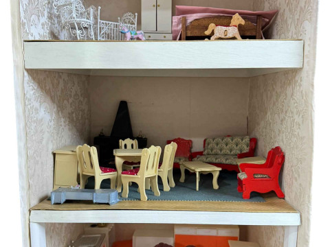 Three dolls houses 'Antique Shop', 'Nursery' and three story box house and a shop front. thumbnail