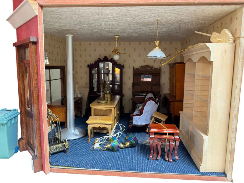 Three dolls houses 'Antique Shop', 'Nursery' and three story box house and a shop front.