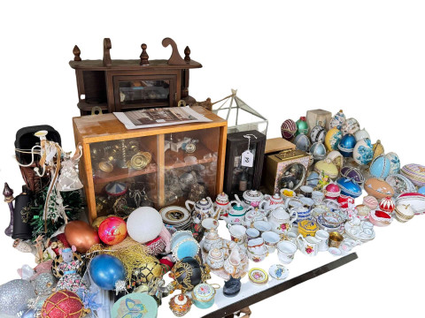Collection of dolls and miniature teawares, decorated eggs on stands,...