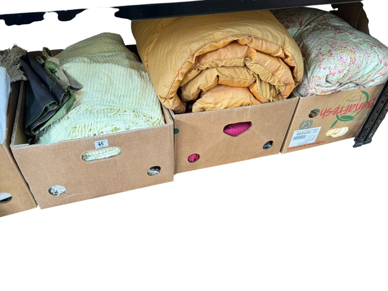 Eleven boxes of assorted linen, bed covers, eiderdowns, and two boxes of jewellery boxes.
