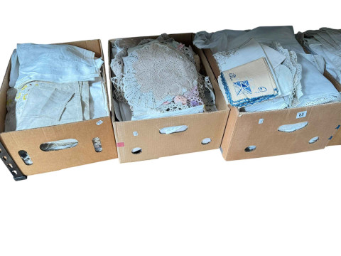 Eleven boxes of assorted linen, bed covers, eiderdowns, and two boxes of jewellery boxes. thumbnail