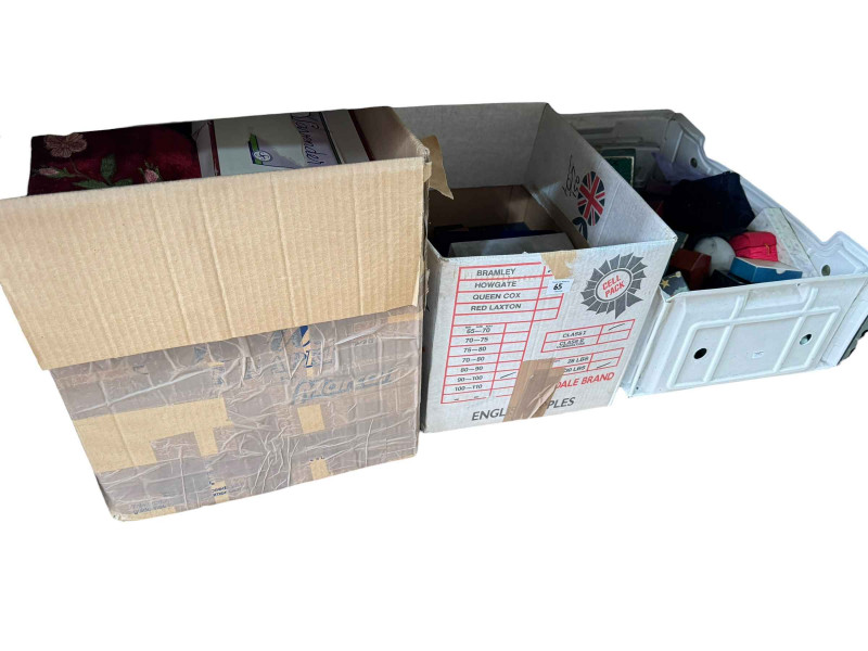 Eleven boxes of assorted linen, bed covers, eiderdowns, and two boxes of jewellery boxes.