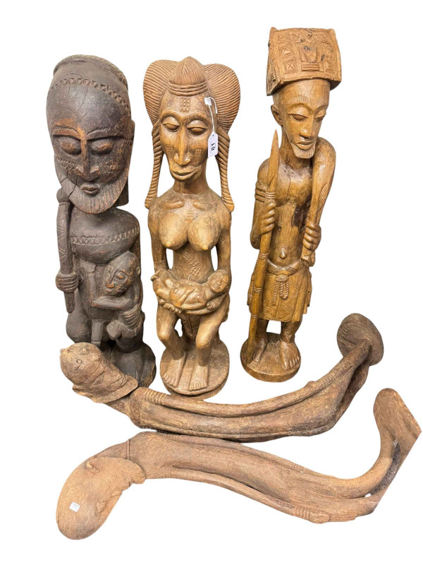 Five tribal wood figure carvings.