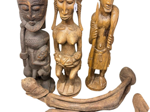 Five tribal wood figure carvings.