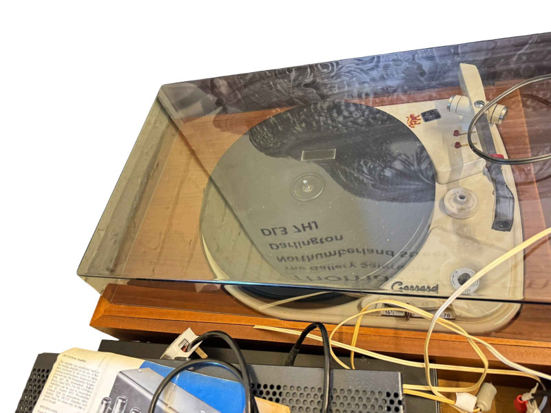 Garrard and Lenco turntables, a Leak tuner and amp, Avantic amp, Philips CD player and a pair of large Goodmans speakers.