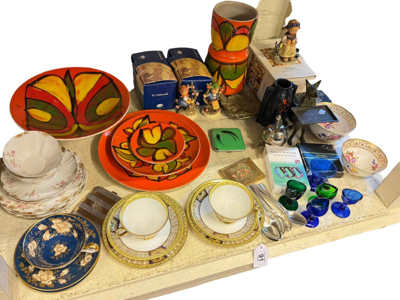 Poole Pottery vase, bowl and three plates, cabinet cups and saucers, Hummel figures, etc.
