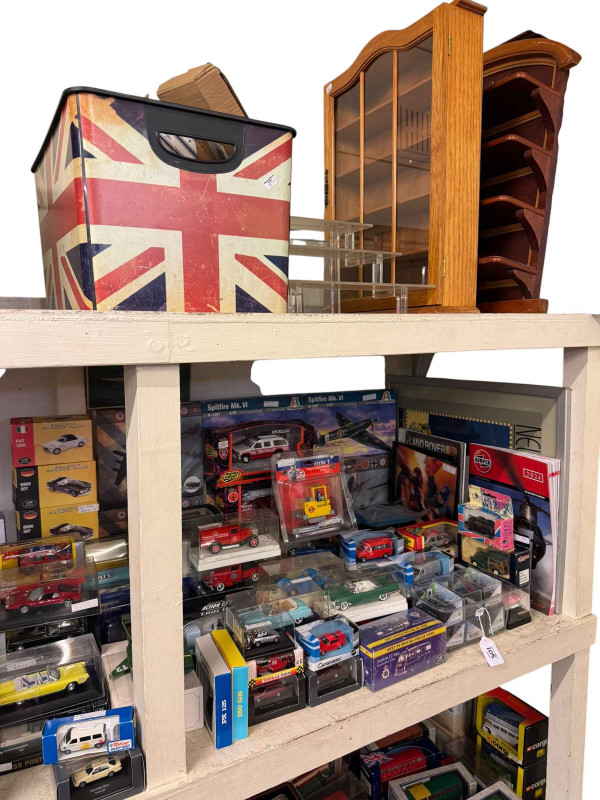 Large collection of mostly boxed model vehicles, aircraft, display stands, prints, etc.