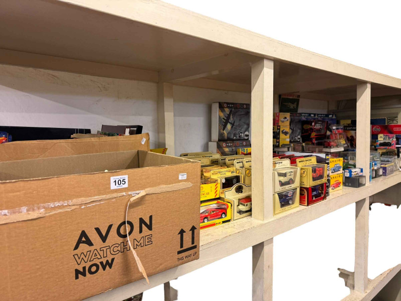 Large collection of mostly boxed model vehicles, aircraft, display stands, prints, etc.
