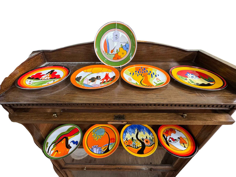 Nine Wedgwood Clarice Cliff plates.
