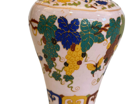 Chinese vine decorated vase with calligraphy to base, 16.5cm.