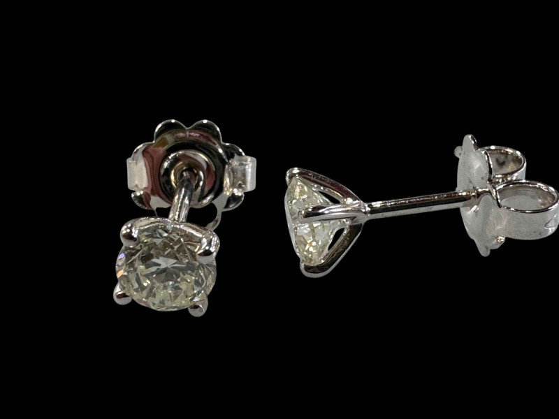 Pair of 18 carat white gold and diamond stud earrings (diamonds totalling 1 carat).
