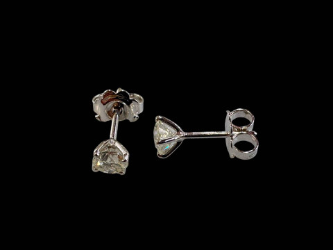 Pair of 18 carat white gold and diamond stud earrings (diamonds totalling...