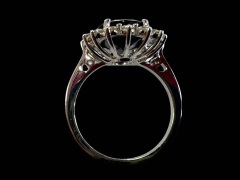 Sapphire and diamond cluster ring set in 18 carat white gold (sapphire 3.3 carats, diamonds 0.5 carats), size L. thumbnail