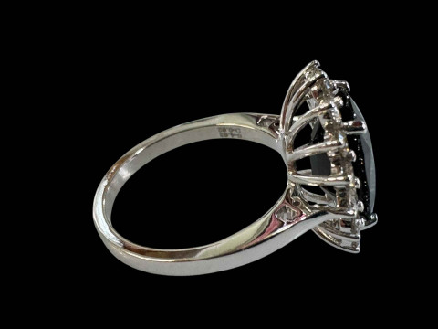 Sapphire and diamond cluster ring set in 18 carat white gold (sapphire 3.3 carats, diamonds 0.5 carats), size L. thumbnail