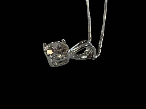 Solitaire diamond pendant set in 18 carat gold mount with an 18 carat white gold chain (diamond 0.90 carats), with certificate. thumbnail