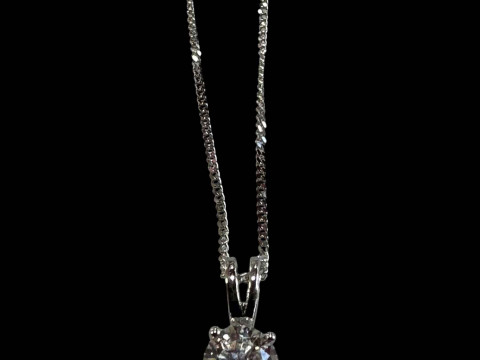 Solitaire diamond pendant set in 18 carat gold mount with an 18 carat...