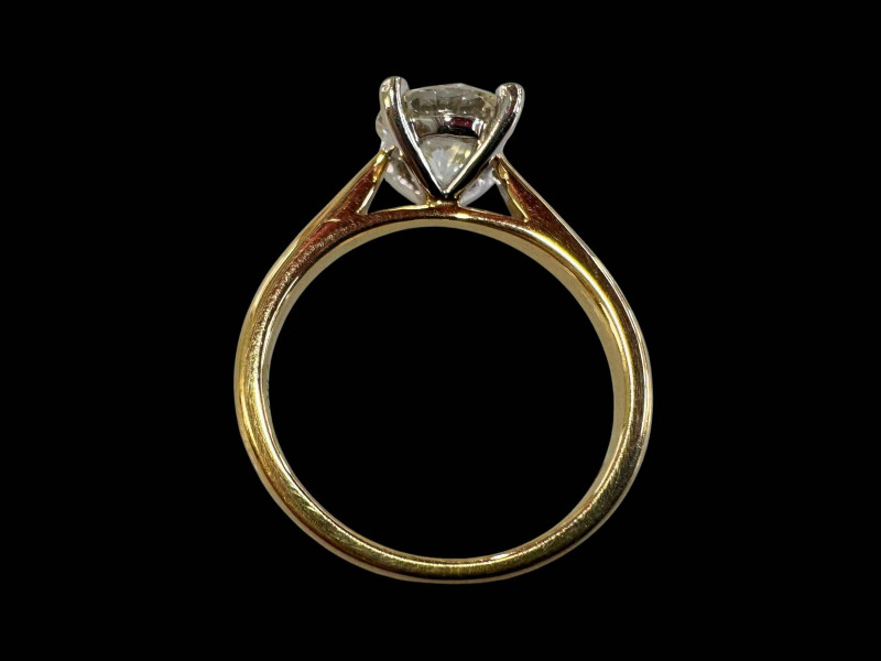 18 carat yellow and white gold claw set solitaire diamond ring, diamond 1.54 carats, size N.