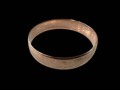 Gold wedding band (unmarked).